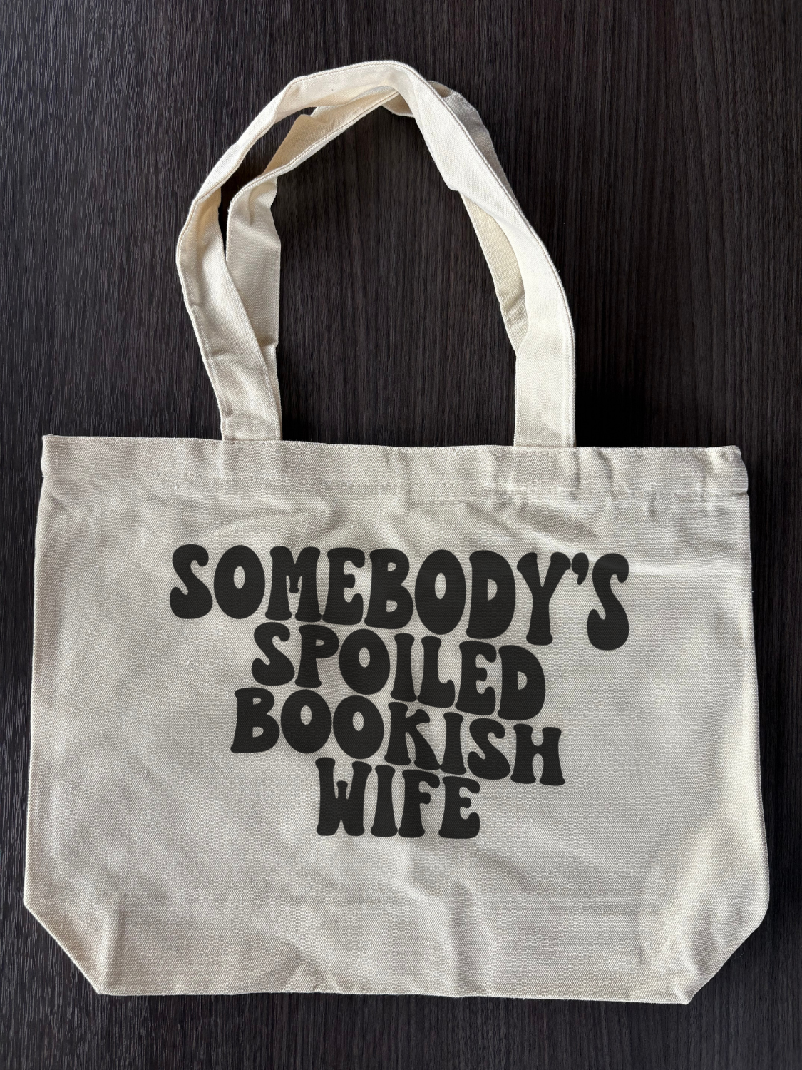 Flat lay of Spoiled Bookish Wife Tote - Somebody's Spoiled Bookish Wife