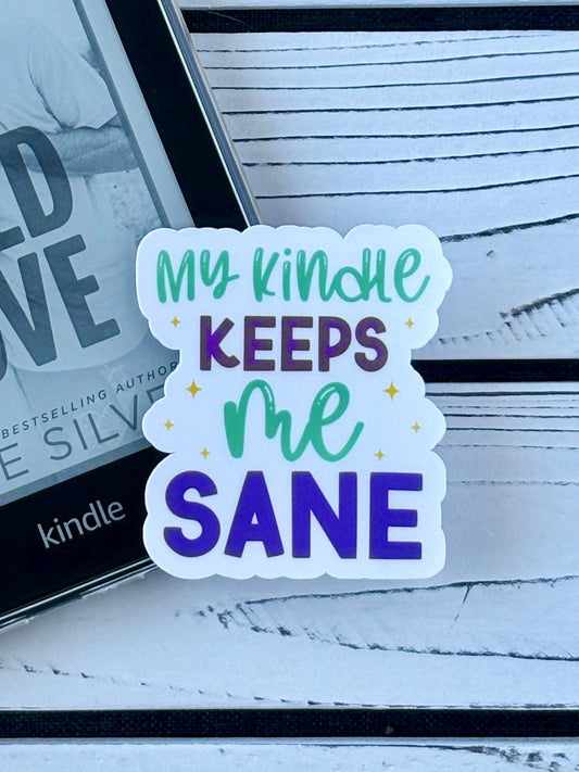 Text sticker that says ‘My Kindle Keeps Me Sane’ in retro typography on a white background