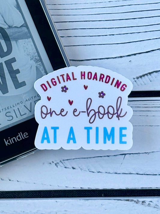 Sticker that says ‘Digital Hoarding One E-Book at a Time’ in colorful retro text on a white background