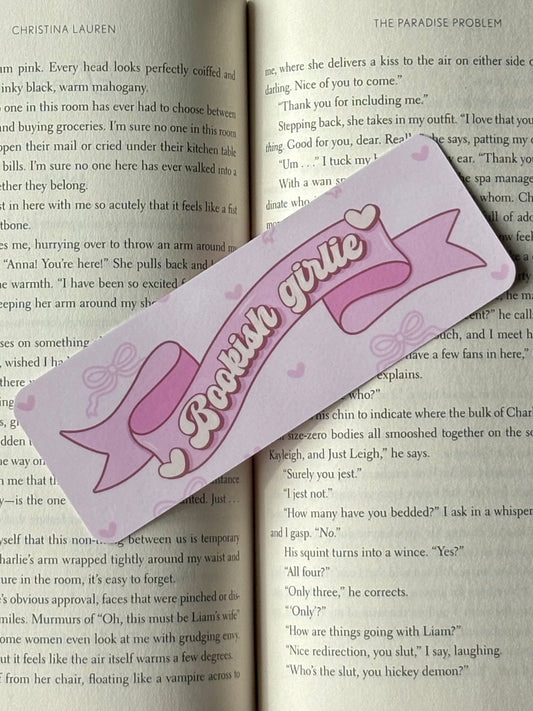 Pink bookmark with 'Bookish Girlie' text on an open book