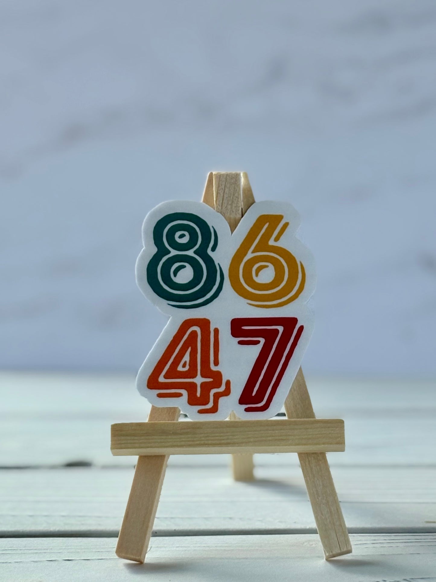 8647 political protest sticker in bold typography, jewel-tone colors, Snark for Social Change collection.