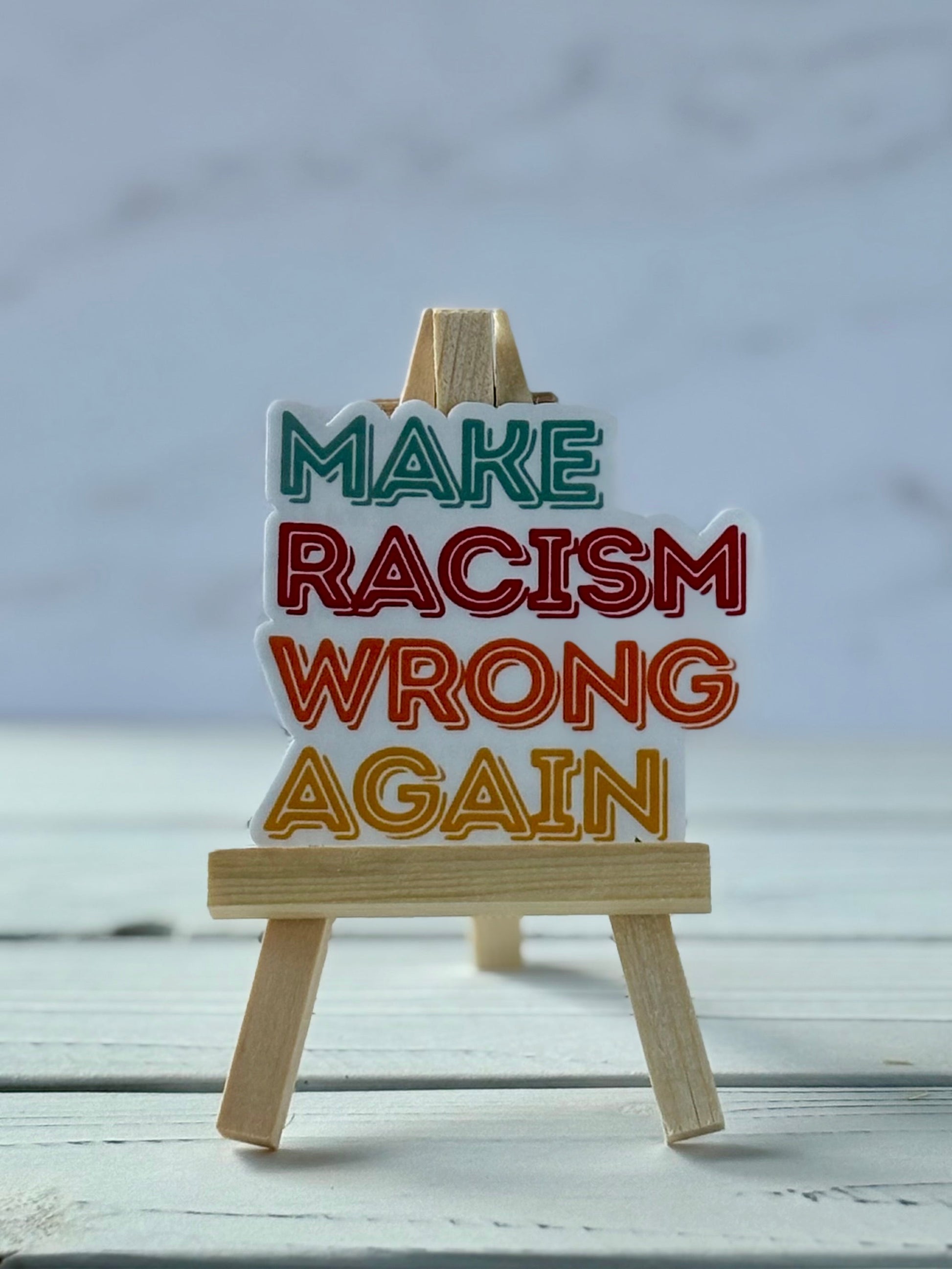 Make Racism Wrong Again protest sticker in bold typography, jewel-tone colors, Snark for Social Change collection.