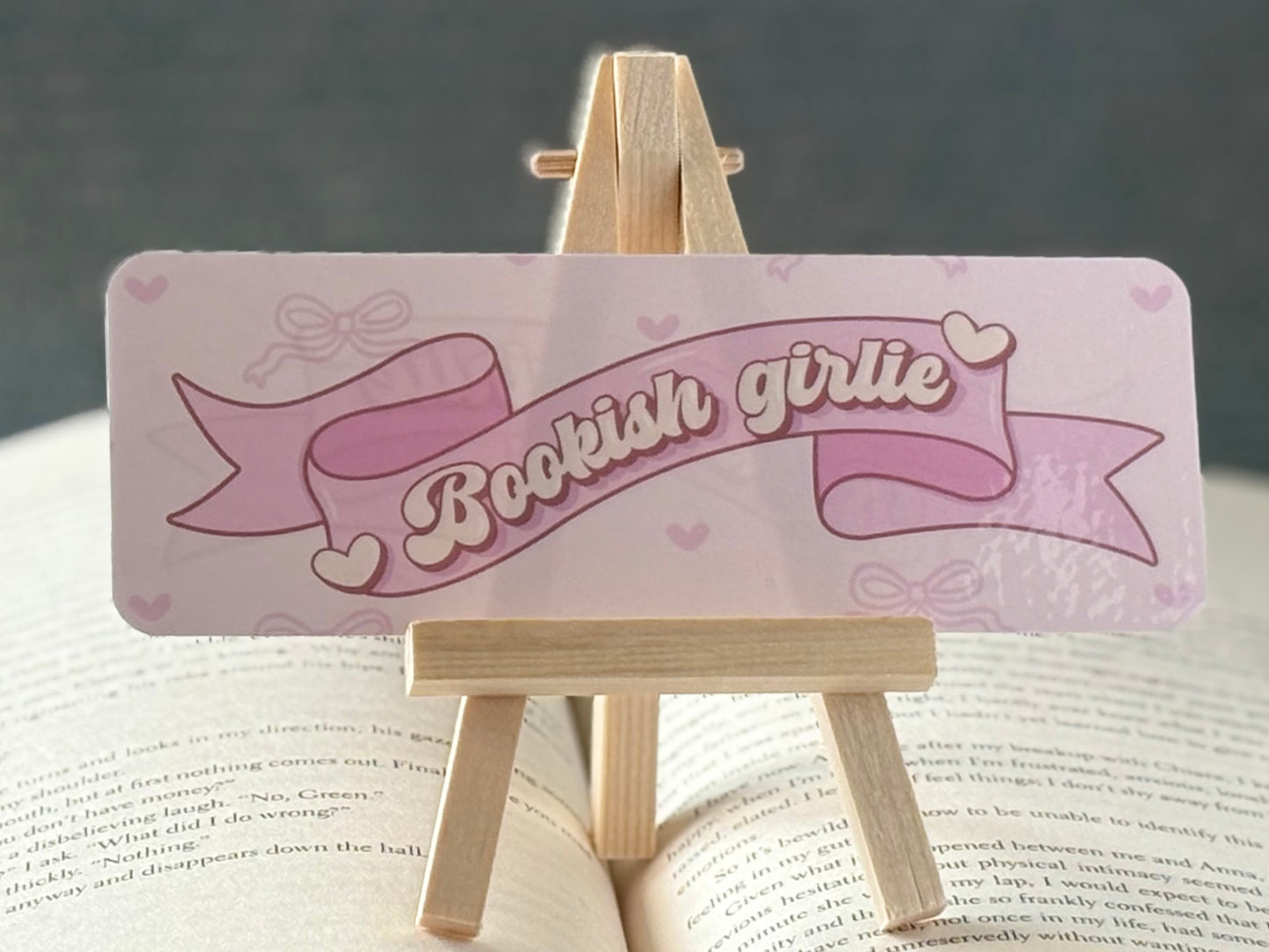 Pink bookmark with 'Bookish Girlie' text on an easel.