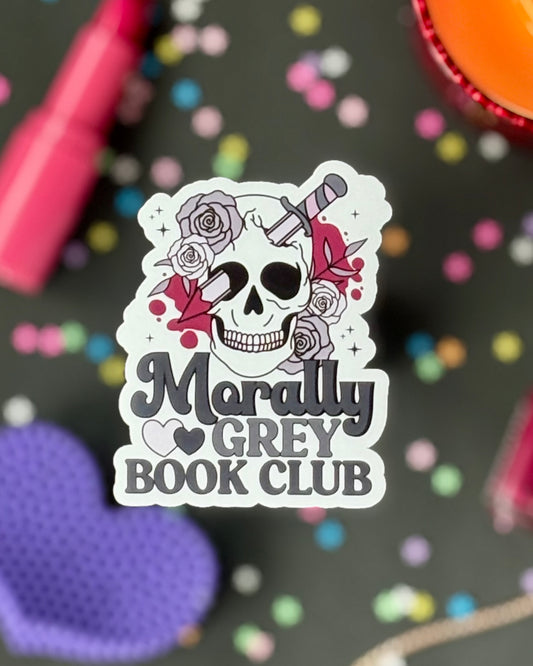 Sticker design in gray tones with pink blood, a skull, knife, roses, and hearts. Text reads “Morally Grey Book Club.”