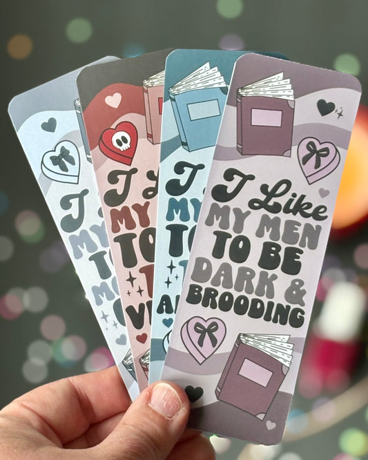 Set of 4 bookmarks with muted backgrounds and retro quotes about. Morally gray, villain, and anti-hero love interests.