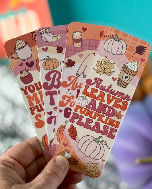 Cozy Autumn bookmark set with pumpkins, fall leaves, candles, and retro lettering
