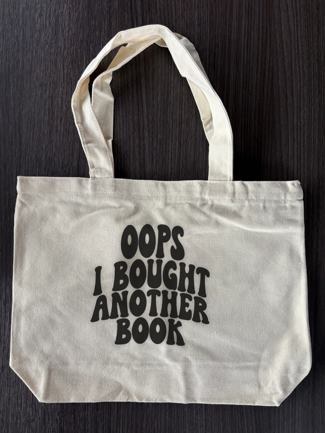 Flat lay of Cute Bookish Tote Bag - Oops I Got Another Book