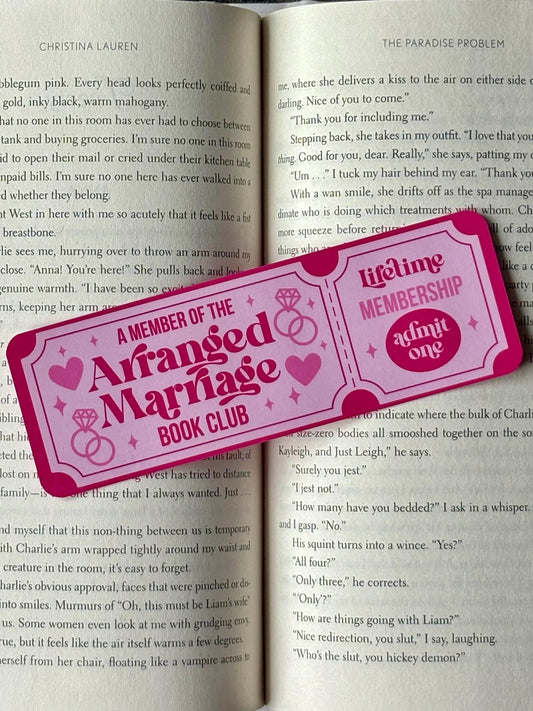 Arranged Marriage Romance bookmark styled like a retro movie ticket in pastel colors.